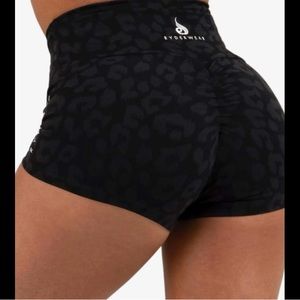 Ryderwear leopard print athletic scrunch shorts